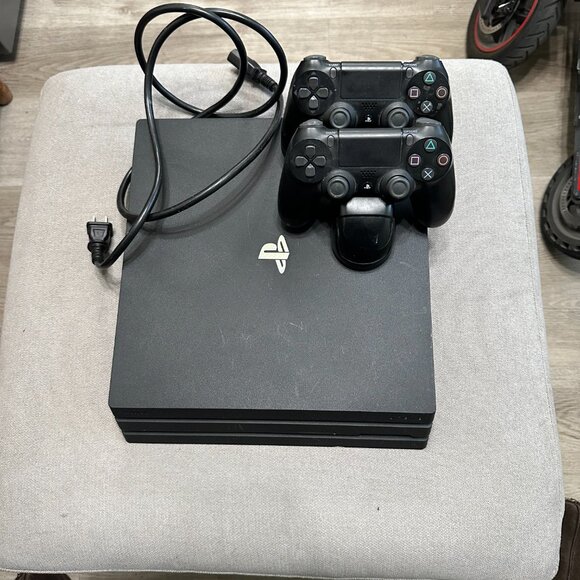 Sony PlayStation 4 Pro (PS4 Pro) Black Video Game Console with 2 Controllers 1TB - Picture 1 of 4